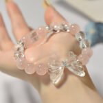 “Natural Pink Quartz Butterfly Bracelet – Creative Crystal Design with White Quartz Wings”